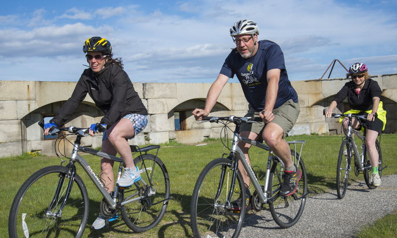 Group Biking near Lighthouse, Photo Courtesy of Summer Feet Cycling