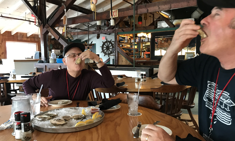 Tourists Trying Oysters. Photo Provided by Maine Day Ventures