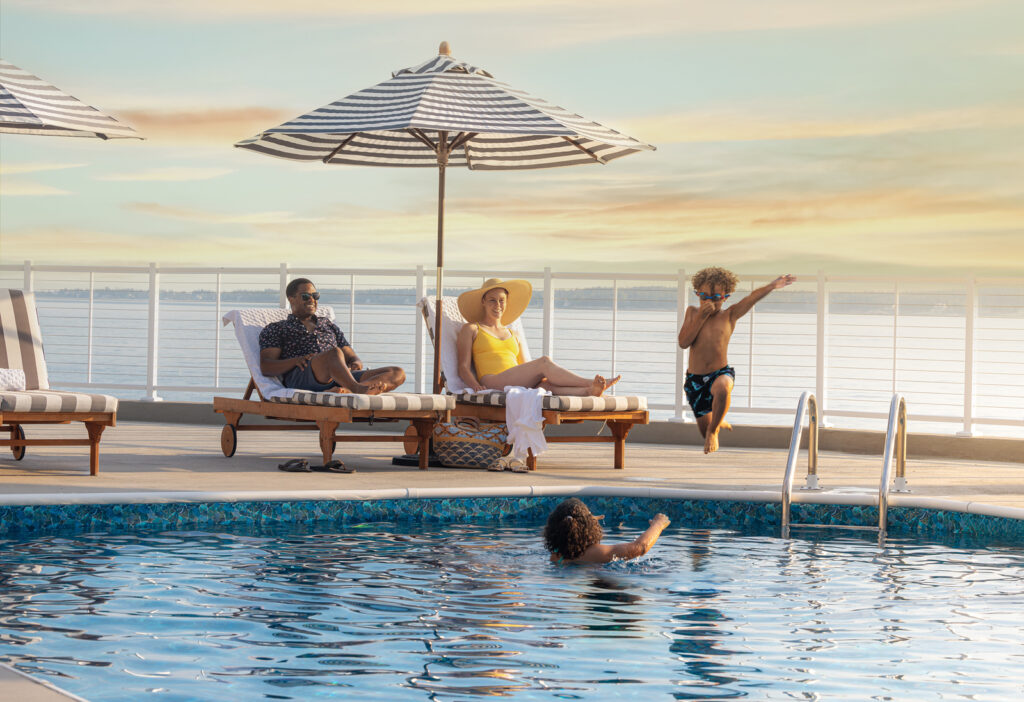 Family at Pool. Photo Credit: Spruce Point Inn