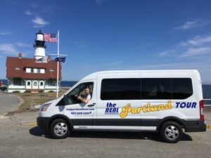 Real Portland Tour Bus in Front of Portland Head Light, Photo Courtesy of Derek Meader via The Real Portland Tour
