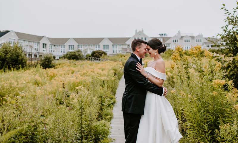 Wedding Couple outside Hotel. Photo Provided by Inn by the Sea