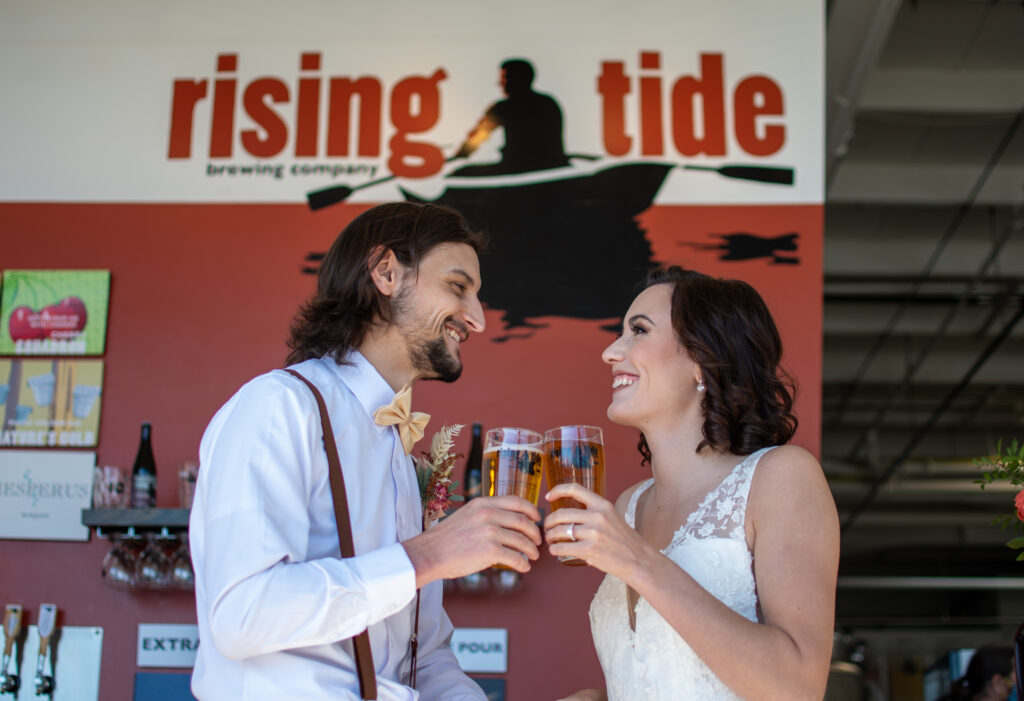 Wedding Couple at Rising Tide. Photo Credit:: Leah's Lens