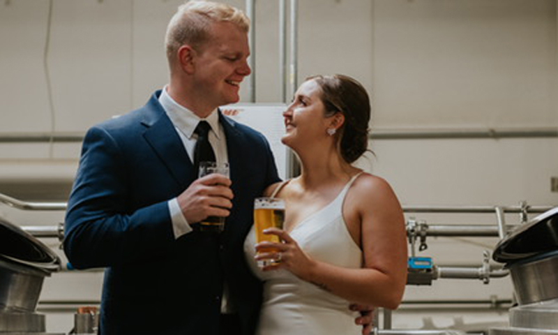 Wedding Couple at Rising Tide. Photo Credit: Little Redd Photography