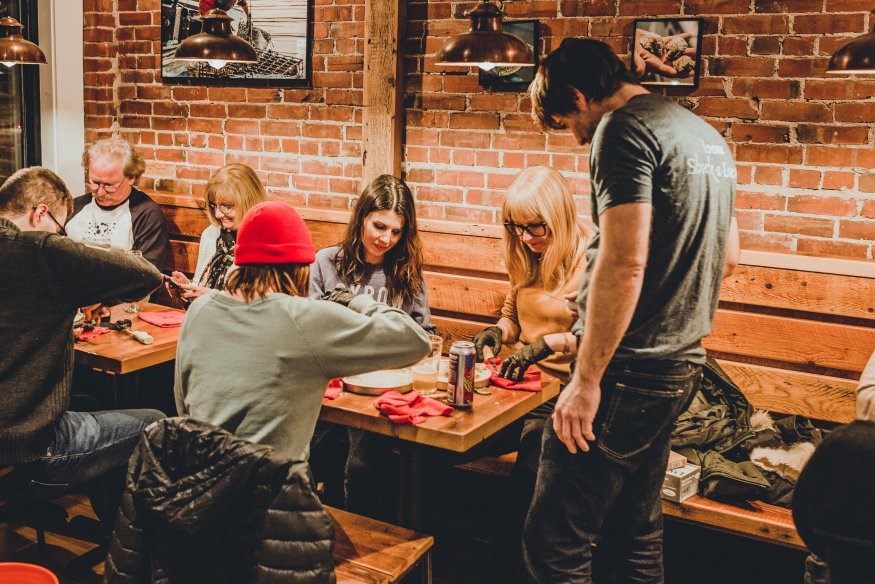 Group Trying Oysters, Photo Courtesy of: Maine Day Trip Tours