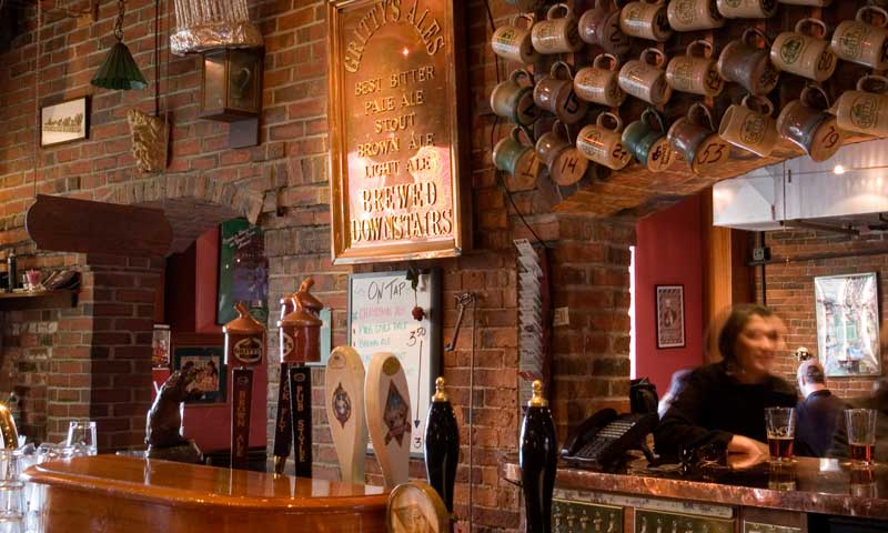 Beer on tap and mugs. Photo Provided by Gritty's