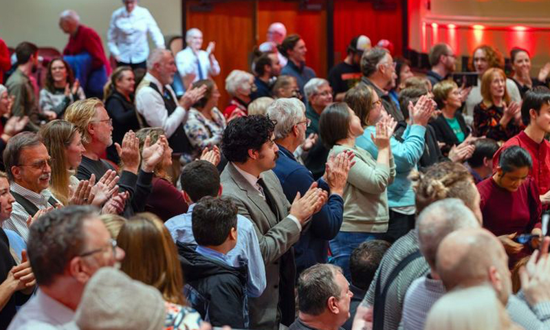 Crowd Applauding at Merrill Auditorium. Photo Credit: Tim Greenway