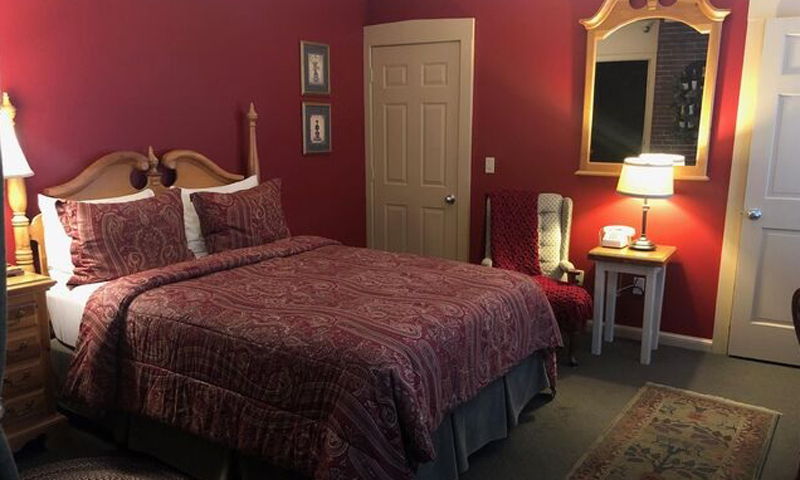 Red King Bedroom, Photo Courtesy of Percy Inn - listing