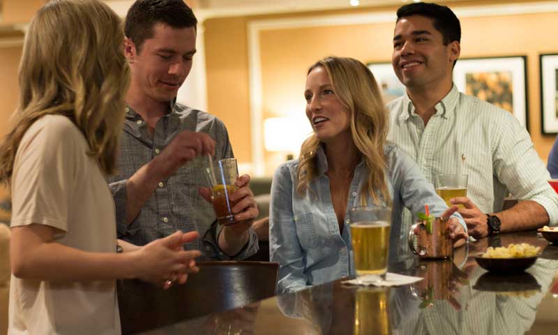 Mingling at Bar. Photo Provided By Holiday Inn By the Bay