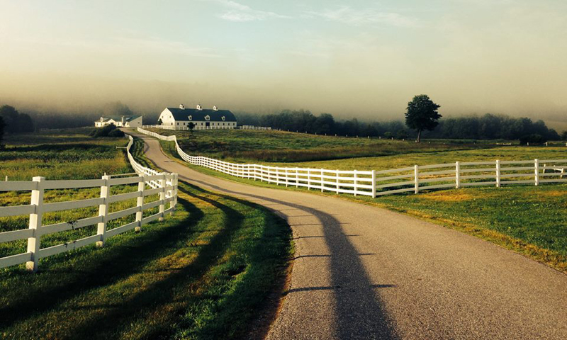 Farm and White Fence. Photo Provided by Pineland Farms