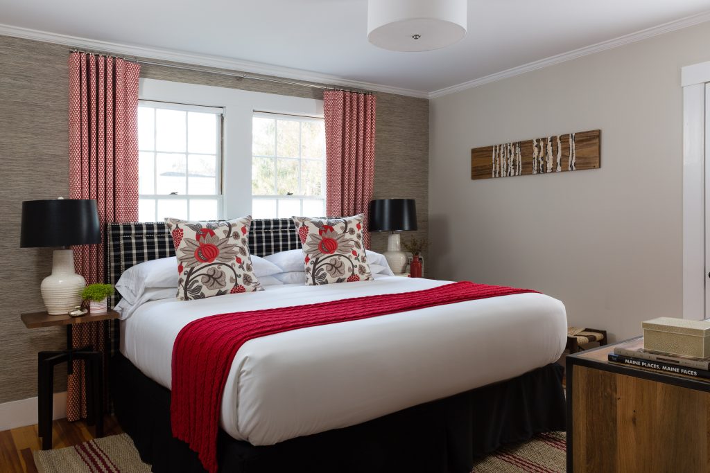 Guest room with a queen size bed. Photo Credit: Rarebrick Photography