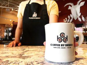 Server with CBD mug. Photo Provided by Coffee By Design