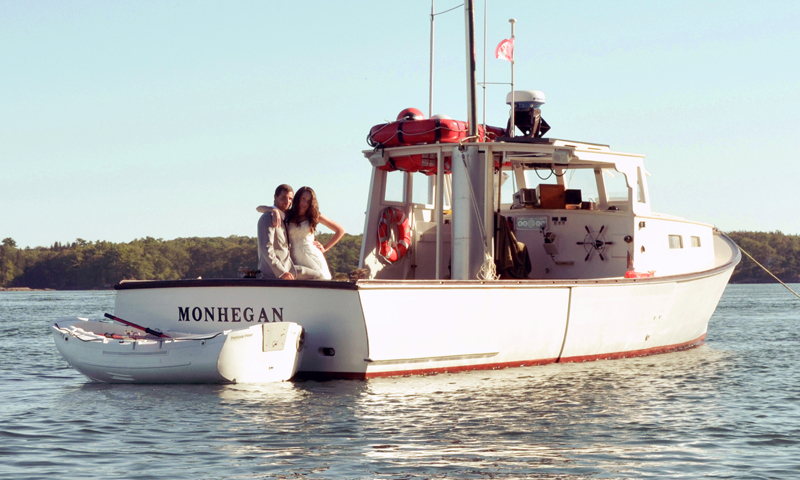 Wedding couple on boat. Photo Provided by Casco Bay Custom Charters Wedding couple on boat. Photo Provided by Casco Bay Custom Charters
