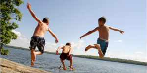 Boys Jumping into Sebago Lake, Photo Courtesy of Maine Camp Experience