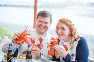 Eating Lobster. Photo credited to Rene Roy Photography