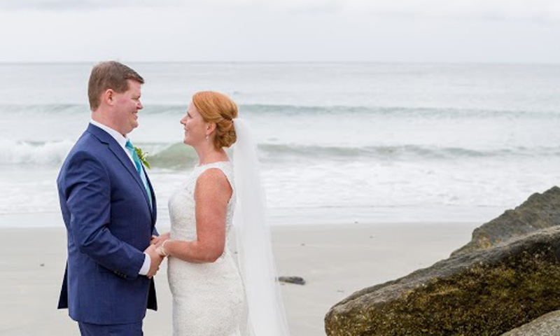 Couple on Beach. Photo credited to Rene Roy Photography Couple on Beach. Photo credited to Rene Roy Photography