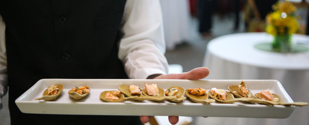 Photo provided for web use Waiter with tray, Photo Credit: Focus Photography