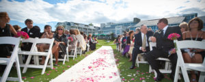 Wedding Ceremony Pink Petals Down Aisle. Photo Credit: Focus Photography