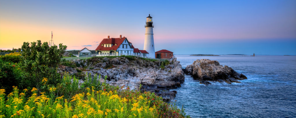 Yellow flowers in the foreground of Portland Head Light Lighthouse, Photo Credit: Kim Seng Yellow flowers in the foreground of Portland Head Light Lighthouse, Photo Credit: Kim Seng