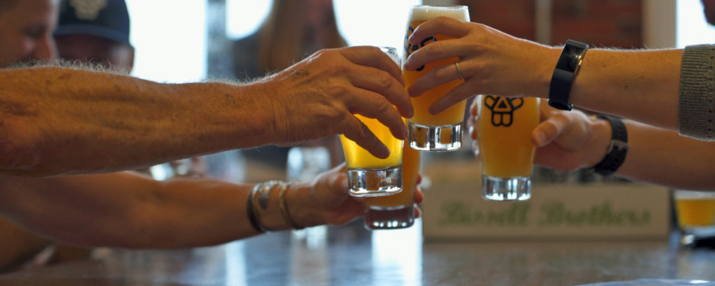 Group Cheers at Brewery, Photo Courtesy of Visit Portland / GLP Films Group Cheers at Brewery, Photo Courtesy of Visit Portland / GLP Films