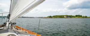 Sailboat Glimpsing Fort Gorges Military Fort, Photo Courtesy of Kirsten Alana / GLP Films