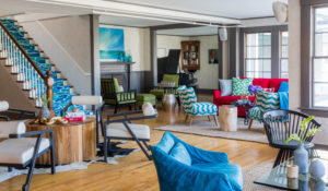 Interior lobby space with multiple seating areas. Photo Credit: Rarebrick Photography