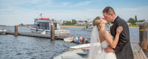 Couple on Dock, Photo Credit: Russel Caron Photography