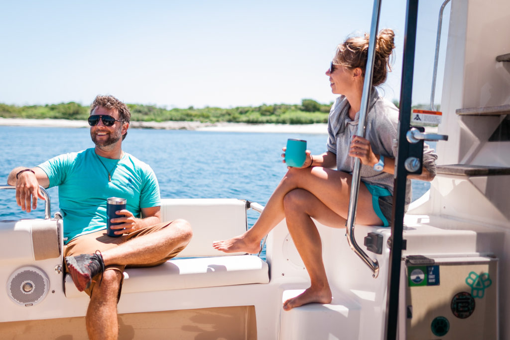 Two People Having Drinks on Boat - Photo Courtesy of Philip Browne / Maine Coast Cruising