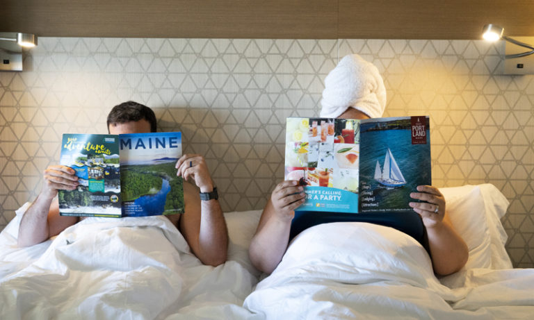 Lounging in Bed with Magazines, Photo Credit: Capshore Photography Lounging in Bed with Magazines, Photo Credit: Capshore Photography