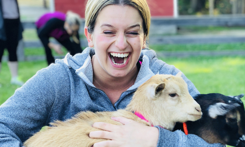 Goat Yoga at Smiling Hill Farm. Photo Credit: Ashley Flowers