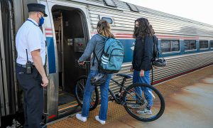 Bikers Boarding Amtrak Downeaster. Photo Courtesy of NNEPRA