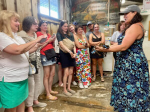 Tour Group with Lobster. Photo Provided by Maine Day Ventures