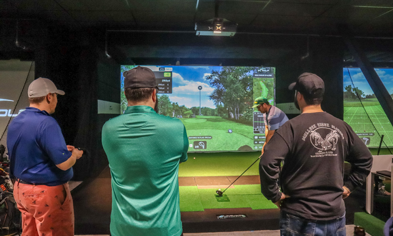 Indoor Golf Simulator at X-Golf Portland. Photo Credit: Lauren Whitney