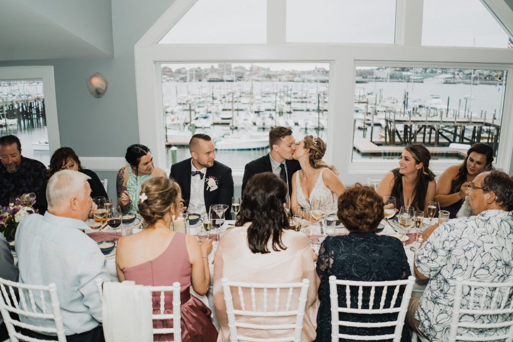 Wedding Party at Dinner table. Photo Credit: The Camerados