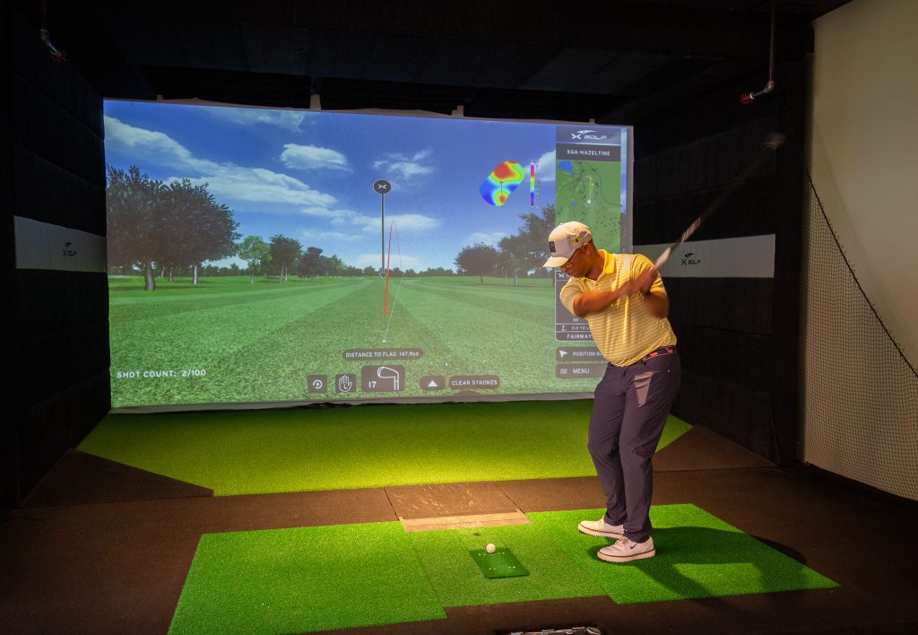 Simulator at X-Golf, Photo Credits: Serena Folding