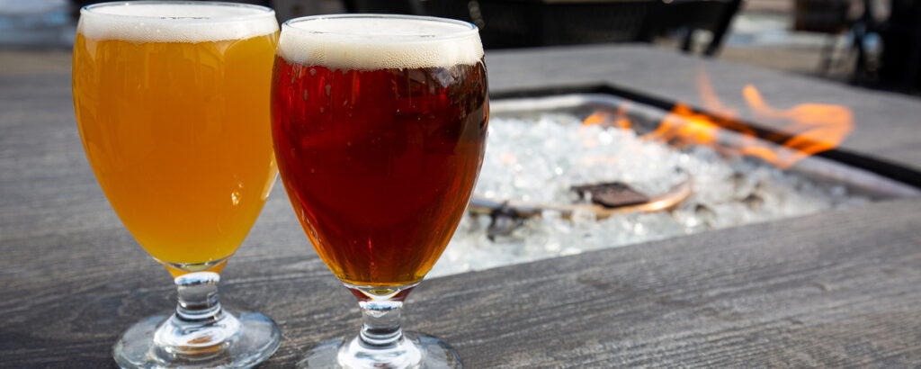 Beers by Outdoor Firepit. Photo Credit: Serena Folding Photography Beers by Outdoor Firepit. Photo Credit: Serena Folding Photography