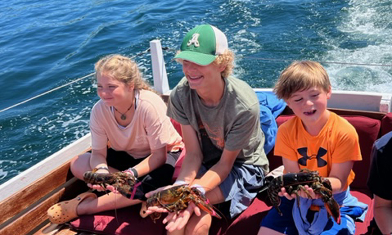 Kids with Lobsters. Photo Provided by Rugosa Lobster Tours