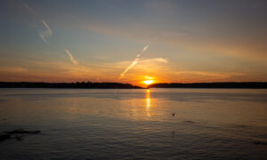 Sunset over water, Photo Credits: Serena Folding