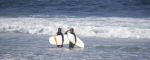 People with surfboards, Photo Credits: Serena Folding