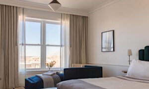 Longfellow Hotel Grand Standard with Back Cove Views room. Photo Credit: Carley Rudd Photography