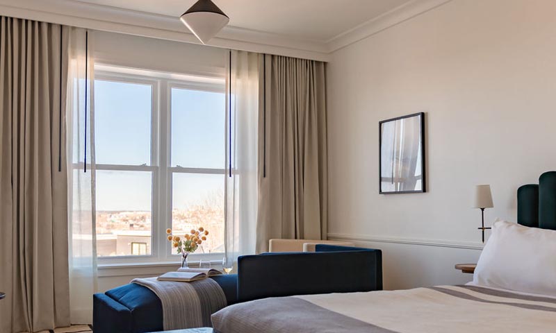 Longfellow Hotel Grand Standard with Back Cove Views room. Photo Credit: Carley Rudd Photography