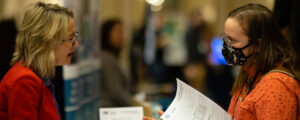 Women speaking, Photo Credit: Focus Photography
