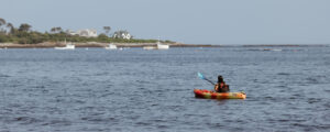 Woman kayaking header. Photo Courtesy of @MarriottBonvoy