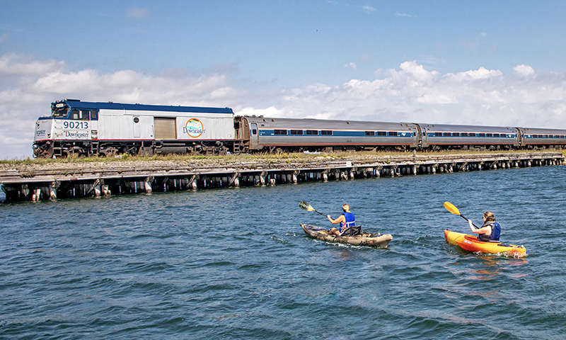 Amtrak passing kayakers. Photo Credit: NNEPRA