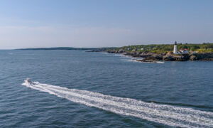 Fore River Sportfishing cruising on water, Photo Credit: PGM Photography