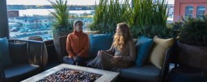 Women at Luna rooftop bar, Photo Credit: Lauren Peters at Visit Portland