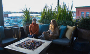 Women at Luna rooftop bar, Photo Credit: Lauren Peters at Visit Portland