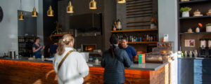 People buying food at Canopy cafe, Photo Credit: Lauren Peters at Visit Portland
