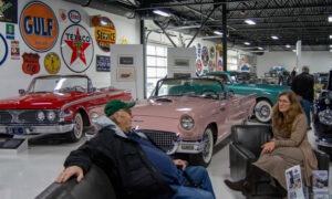 People sitting at Maine Classic Car Museum, Photo Credit: Lauren Peters at Visit Portland