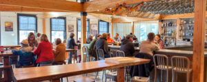 Dinning at Nonesuch Brewery, Photo Credit: Lauren Peters at Visit Portland