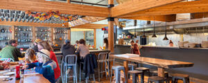 Dinning at Nonesuch Brewery, Photo Credit: Lauren Peters at Visit Portland